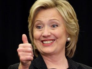 Hillary Clinton with her thumbs up