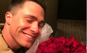 Colton Haynes with roses