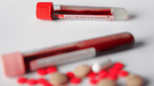Blood vial and pills