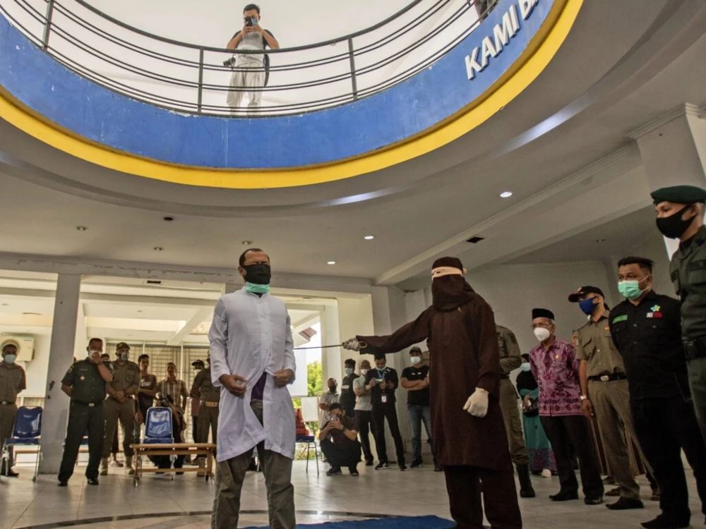 Indonesian Men Caned In Brutal Spectacle After Being